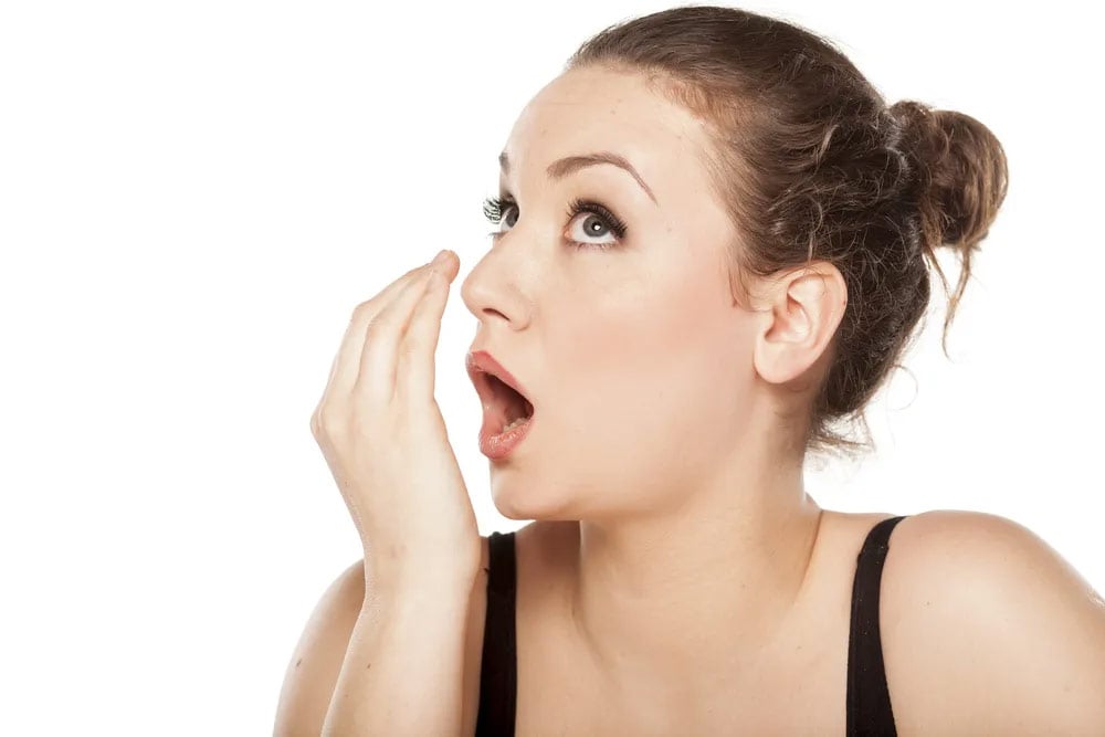 women checking her breath